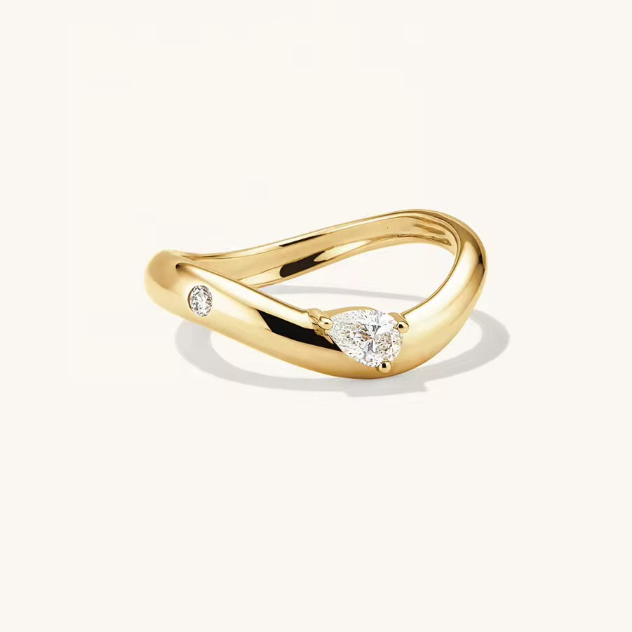 Floating teardrop and sparkle ring