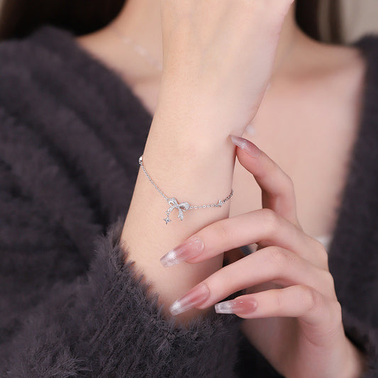 Shimmering Bow Drop Chain Bracelet